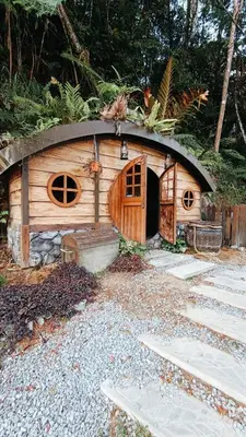 a small wooden dog house with a round roof at A3-6-1Silverpark LuxMountsin view Lifted unit in Bukit Fraser