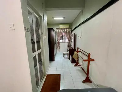 a hallway of a house with a staircase and a room at Inap by KF in Bayan Lepas