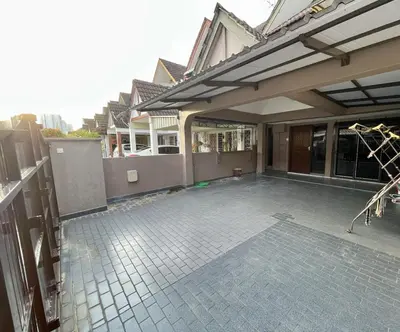 an outside view of a house with a patio at Inap by KF in Bayan Lepas