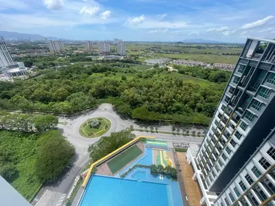 an aerial view of a building with a swimming pool at Happy Home Metropol - BM in Bukit Mertajam