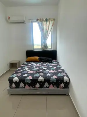 a small bed in a room with a window at Happy Home Metropol - BM in Bukit Mertajam