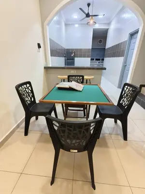 a ping pong table and chairs in a kitchen at Hello Pangkor Home 73A - A Nest for 12 buddies in Pangkor