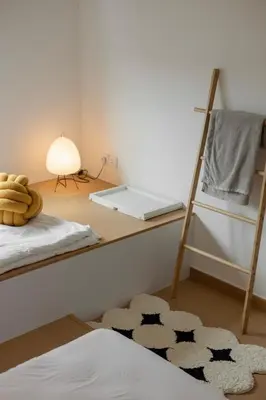 a bedroom with a bunk bed with a ladder and a rug at Muji Style Minimalist Room Only NOT STUDIO in Bukit Mertajam