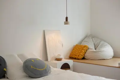a room with a bed and pillows on a shelf at Muji Style Minimalist Room Only NOT STUDIO in Bukit Mertajam