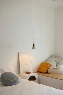 a bedroom with a bed and a couch and a table at Muji Style Minimalist Room Only NOT STUDIO in Bukit Mertajam