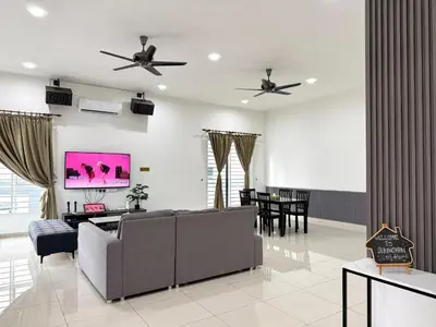 a living room with a couch and a tv at Sekinchan 2008 Homestay KaraokeBBQ 20pax \u4e09\u5c42\u7b80\u7ea6\u98ce\u540d\u5bbf in Sekincan