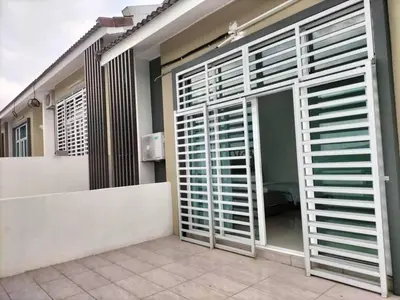 a house with a window with shutters on it at Cozy 4 bedrooms Double Storey Homestay, in front Kulim Central Mall in Kulim