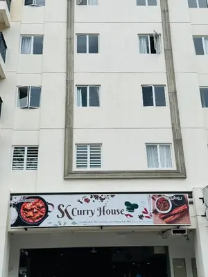 a building with a sign for a city house at Rich field Cameron Highlands Homestay-Peony Square-3BDR 2BTH-8PAX in Cameron Highlands