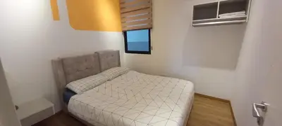 a small bedroom with a bed and a window at End Unit, The Cove Residence, Tambun 8 pax in Ipoh