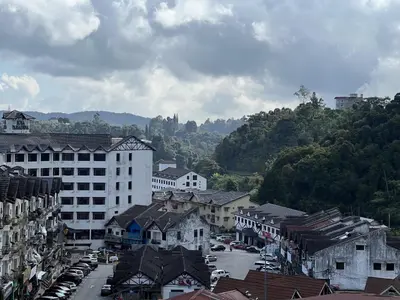 a view of a city with buildings and cars at Moriash Stay in Brinchang