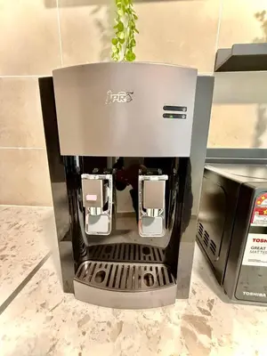 a coffee maker sitting on top of a counter at ICC Luxury Suites by Grab A Stay in Ipoh
