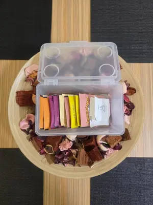 a plastic container filled with different types of food at The Highland Hive in Tanah Rata