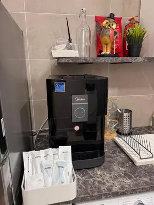 a coffee maker on a counter in a kitchen at ICC Suites Ipoh City Centre Walking Distance to Shopping Mall in Ipoh