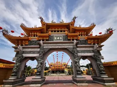 an archway at the entrance to a temple at GHome Cheerful comfort home in Butterworth