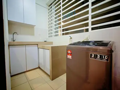 a kitchen with a stove and a sink in it at Ipoh Majestic Modern City 2BR Condo - Food Street in Ipoh