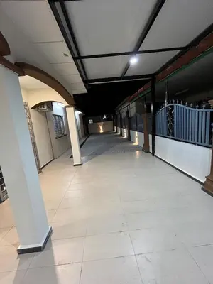 an empty hallway of a building with a ceiling at KMK Homestay in Sungai Petani