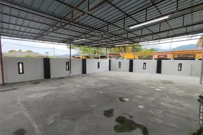 an empty parking lot in a large building at DRH Villa in Ipoh