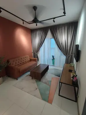 a living room with a couch and a table at CAMERON HIGHLAND CENRTUM BRINCHANG Homestay By Dcozy 6-7pax in Brinchang