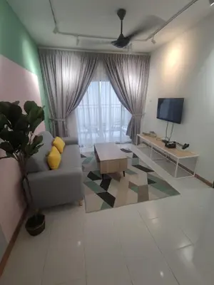 a living room with a couch and a tv at CAMERON HIGHLAND CENRTUM BRINCHANG Homestay By Dcozy 6-7pax in Brinchang