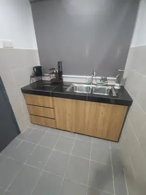a kitchen with a sink and a tiled floor at CAMERON HIGHLAND CENRTUM BRINCHANG Homestay By Dcozy 6-7pax in Brinchang
