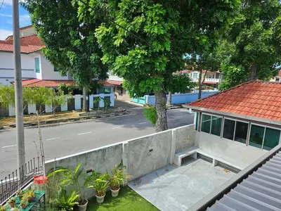 an aerial view of a street with a building at Leisure Homestay BM in Bukit Mertajam