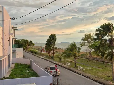 a car parked on the side of a street at Mega Seaview Escape - Butterworth Penang in Butterworth