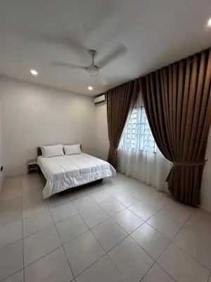 a bedroom with a bed and a large window at Teratak MakTeh in Kampong Ayer Melintas Besar