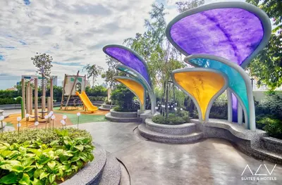 a rendering of a park with slides and a playground at 22 Macalisterz's Armoire Collection by ALV in George Town