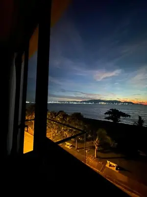 a view of the ocean from a train window at Seaview Master Room - Ensuite Bath in Butterworth in Butterworth
