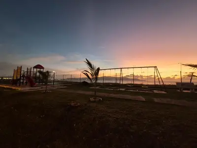 a park with a playground with a swing at Seaview Master Room - Ensuite Bath in Butterworth in Butterworth