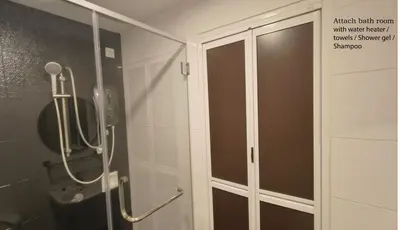a shower with a glass door in a bathroom at H2H - Majestic A19 stay station - 5pax in Ipoh
