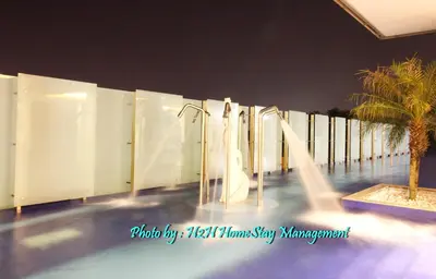 a water park at night with a water slide at H2H - Majestic A19 stay station - 5pax in Ipoh