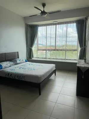 a bedroom with a bed and a large window at 2Bedroom Condo at Cinta Sayang Resort in Sungai Petani