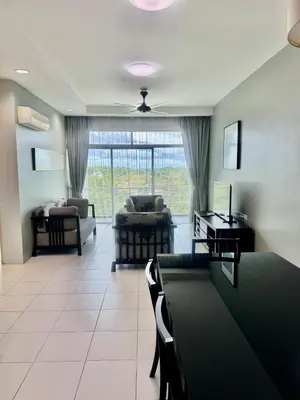 a living room with a couch and a table at 2Bedroom Condo at Cinta Sayang Resort in Sungai Petani