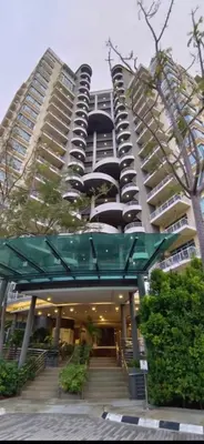 a large building with stairs in front of it at Premium Condo at Cinta Sayang Club in Sungai Petani