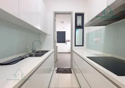 a kitchen with white counters and a sink at Harborlight Jazz Suite in Tanjong Tokong