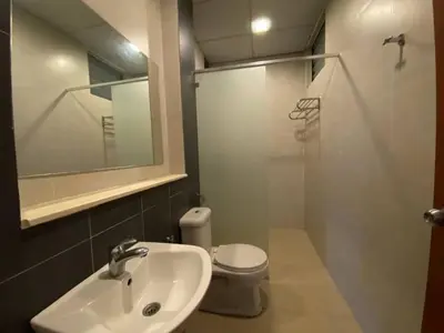 a bathroom with a sink and a toilet and a mirror at Nova Homestay Cameron Highlands in Brinchang