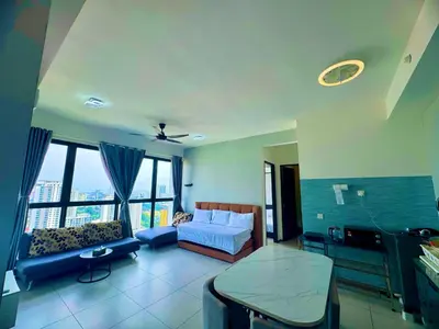 a living room with a bed and a couch at urban suites 3BR 10pax b30 infinity pool in Jelutong