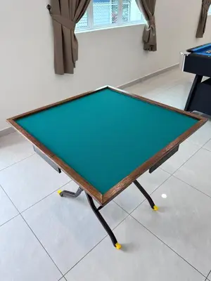 a green ping pong table in a room at \u9003\u79bb\u57ce\u5e02 mumu home in Gopeng