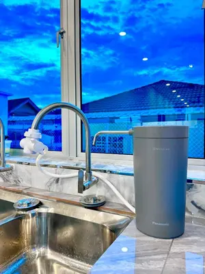 a kitchen counter with a sink and a window at \u9003\u79bb\u57ce\u5e02 mumu home in Gopeng