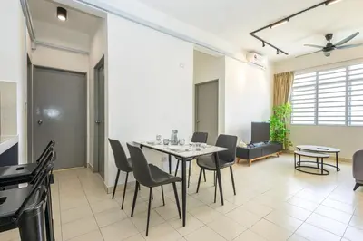 a dining room with a table and chairs at O-Homestay at Falim 2 parking Mus lim friendly in Ipoh