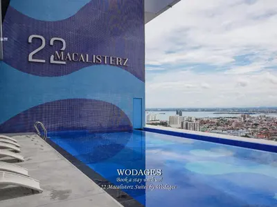 a swimming pool on the roof of a building at 22 Macalisterz George Town by Wodages in George Town