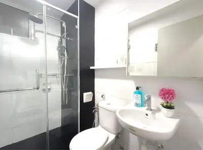 a bathroom with a toilet and a sink and a shower at H2H - Welcome Home - Majestic Ipoh - 5pax in Ipoh