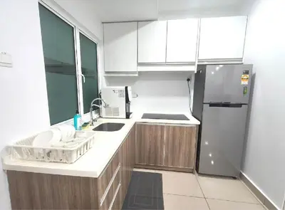 a kitchen with white counters and a refrigerator at H2H - Welcome Home - Majestic Ipoh - 5pax in Ipoh