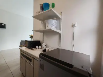 a kitchen with a counter top in a room at Studio BARRINGTON SQUARE II in Brinchang