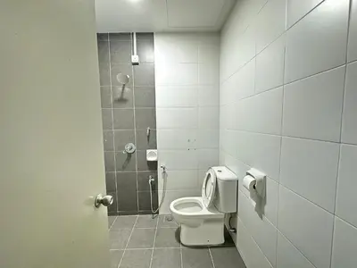 a bathroom with a toilet and a shower at Homestay Golden Hills in Brinchang