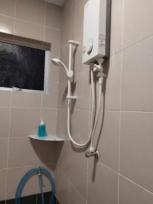 a shower in a bathroom with a shower at Hello Pangkor Home 77 - A Nest for 15 buddies in Pangkor