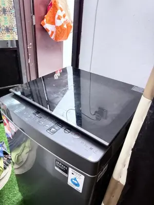 a black appliance with a glass top on top at Seri Pinggiran HOMESTAY Bertam Perdana in Kepala Batas
