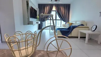 a living room with a chair and a couch at NEW Bt Kawan8 3BR Suite-IKEA-UOW-KDU-ColumbiaAsia in Simpang Ampat