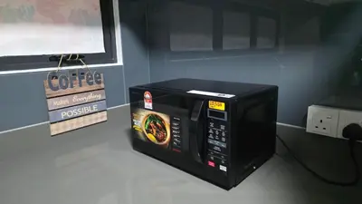 a microwave oven sitting on top of a counter at NEW Bt Kawan8 3BR Suite-IKEA-UOW-KDU-ColumbiaAsia in Simpang Ampat